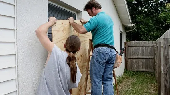 Getting plywood sized for your windows now will save you the hassle later on.